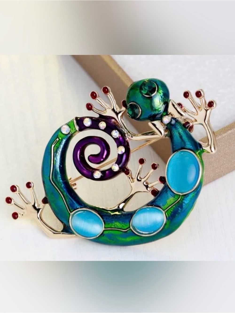 Colorful Green Geico Brooch with Blue Cabochons